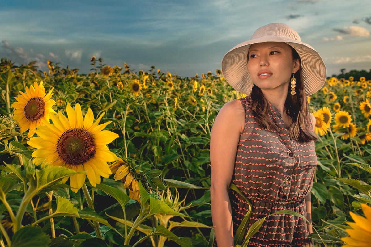 Sunny Ra in a sunflower field on the backroads of Kentucky