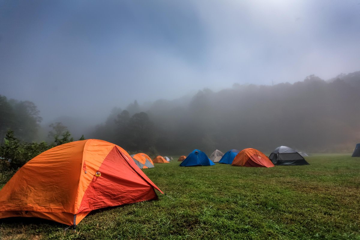 Climbers sleep in their tents during a foggy night at Miguel's Pizza